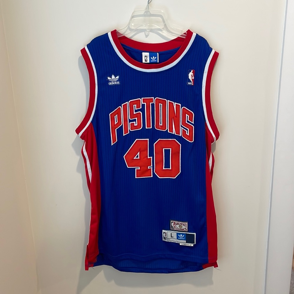 Mens Large Bill Laimbeer pistons blue jersey. Used in great condition.